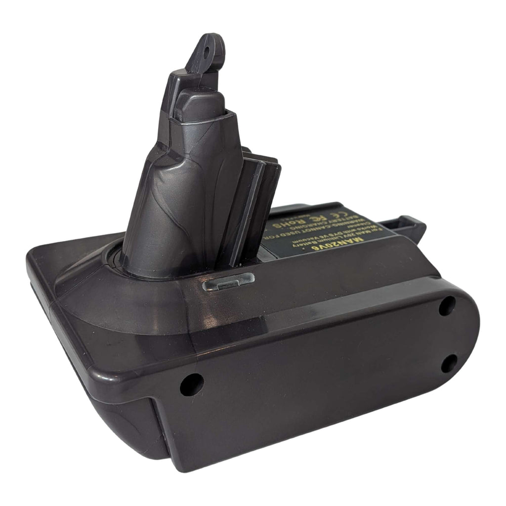 Craftsman 20V to Dyson V6 battery adapter - Dyson tool-side stem with its contact slots, warning label alongside