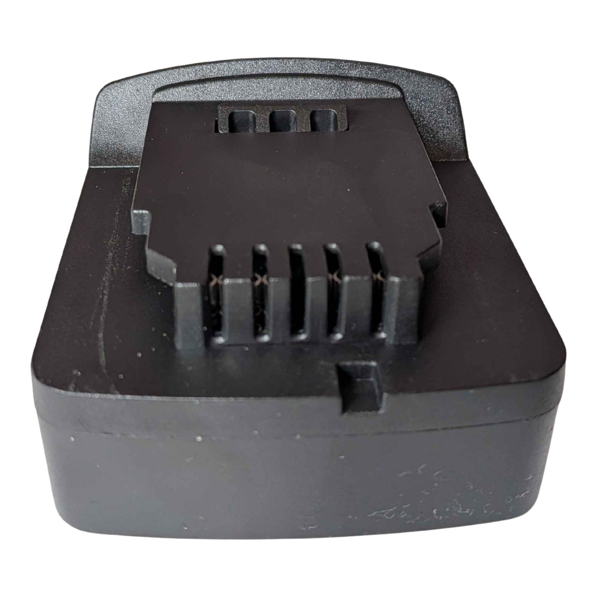 Parkside X20V to DeWalt 20V MAX battery adapter - DeWalt tool-side terminal block end-on, five slots and a three-hole vent